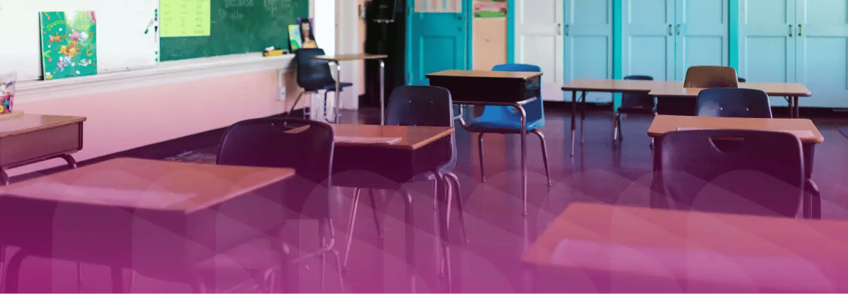 Empty classroom. Magenta filter over image.