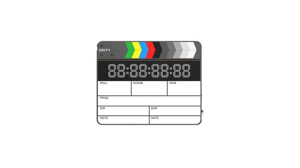 Digital clapperboard with rainbow stripes on top.