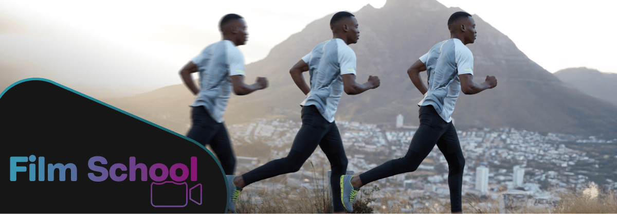 Film rate of man jogging to provide illusion of movement against a city and mountain backdrop and WeVideo's "Film School" logo in the bottom left corner.